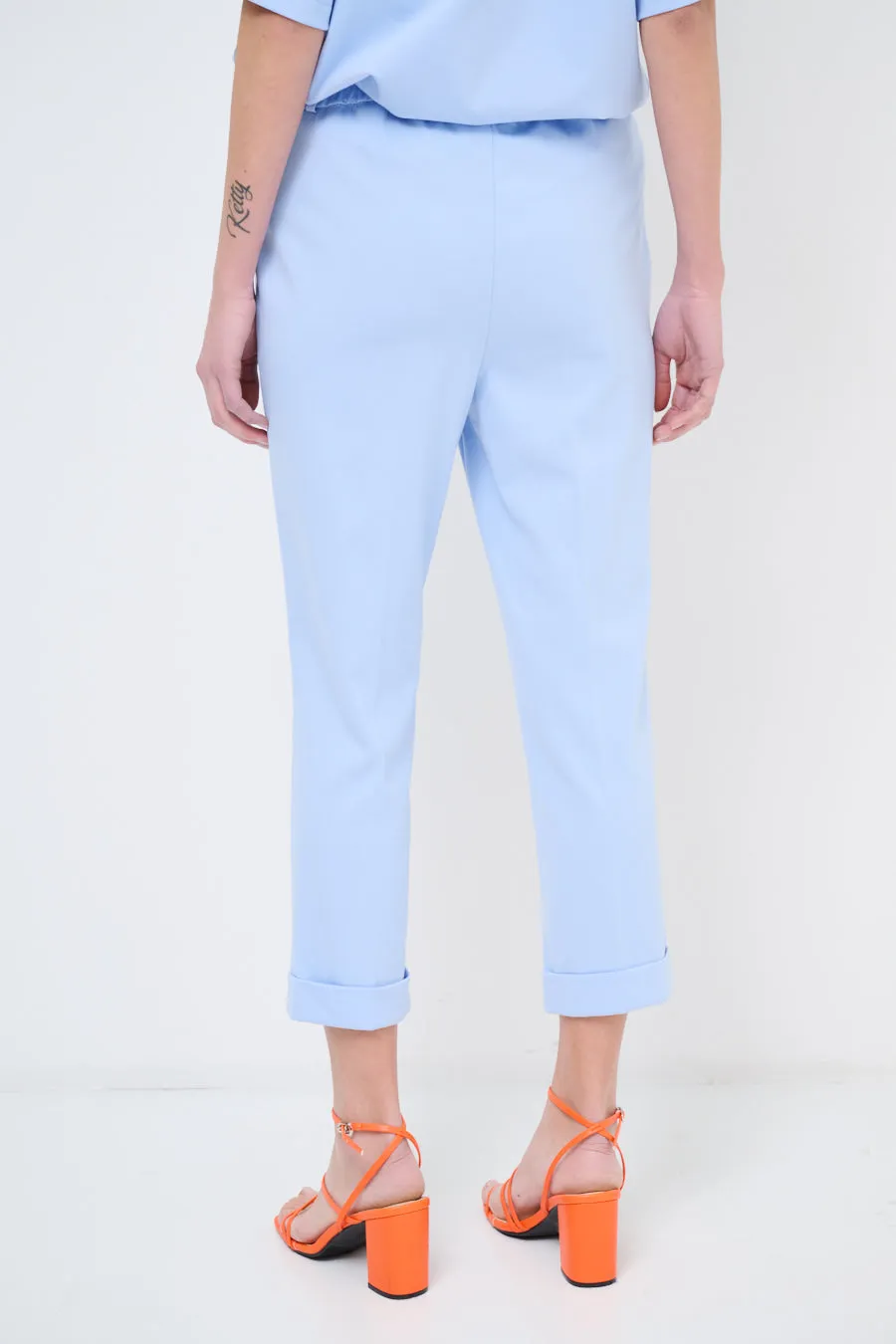 Cropped tailored trousers with rolled cuffs wholesale